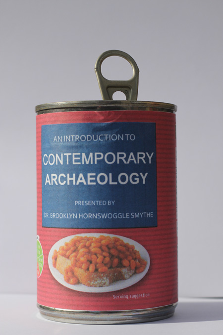 Bean can with label, “An Introduction to Contemporary Archaeology”