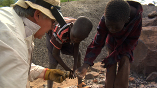 Brigitte Senut in the field with native Kenyans